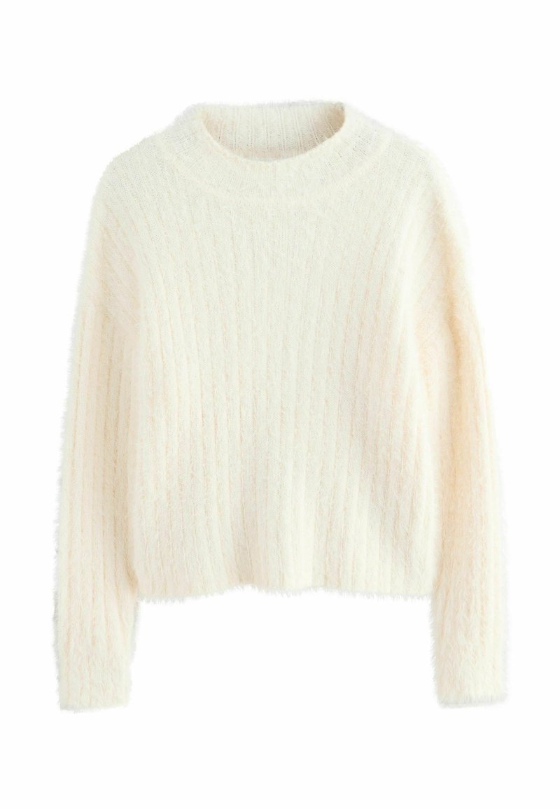 Pull en crème, pelucheux, avec une texture côtelée, un col rond et des manches longues. Le design court ajoute une touche contemporaine.