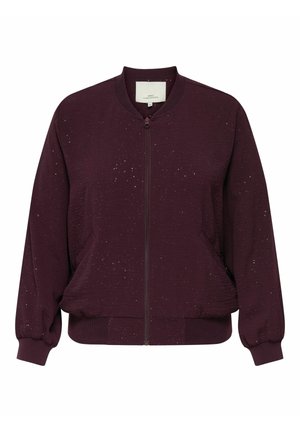 Burgundská bomber jacket s předním zipem, žebrovanými manžetami a lemem, texturovanou tkaninou a rozptýlenými metalickými akcenty. Obsahuje boční kapsy.