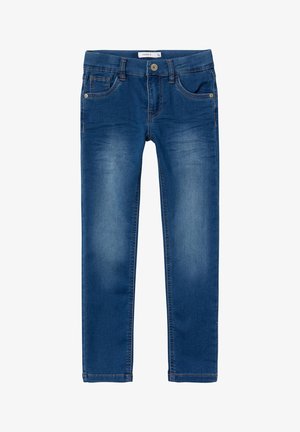 Jean slim bleu en denim avec poches avant et arrière, fermeture par boutons, et détails légèrement délavés sur les cuisses.