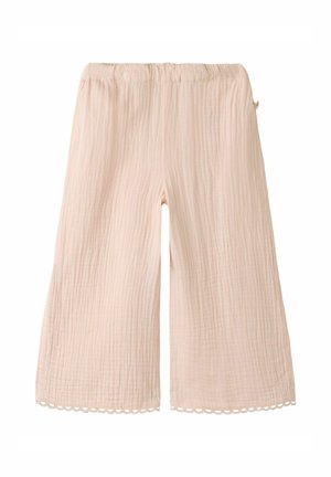 Svetlo béžové nohavice širokého strihu s elastickým pásom a štruktúrovanou tkaninou, zdobené čipkovaným lemom so zvlneným okrajom na spodku.