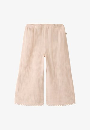 Pantalon beige clair à jambes larges avec taille élastique et tissu texturé, doté d'un bord en dentelle festonnée à l'ourlet.