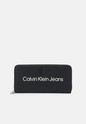 SCULPTED ZIP AROUND MONO - Monedero - fashion black