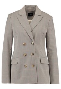 Dvouvrstvý blejzr s kostkovaným vzorem v barvě béžové a černé, s klopami, čtyřmi zlatými knoflíky a bočními kapsami.