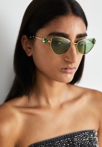 Lunettes de soleil - green