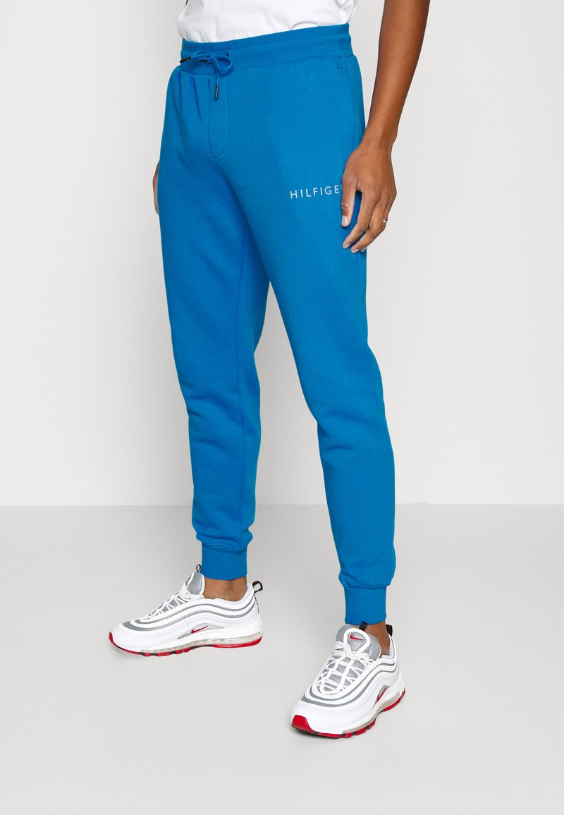 Tommy Hilfiger POP COLOR Tracksuit bottoms shocking blue/blue Zalando