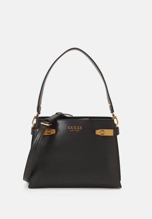 Sort Guess håndtaske i læder med gulddetaljer, top håndtag, justerbar skulderrem og præget logo på fronten.