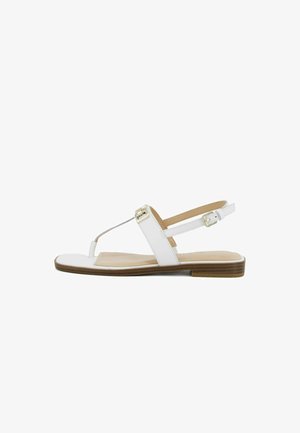 Sandalo piatto bianco con cinturino a infradito, fibbia regolabile alla caviglia, soletta imbottita e tacco basso in legno.