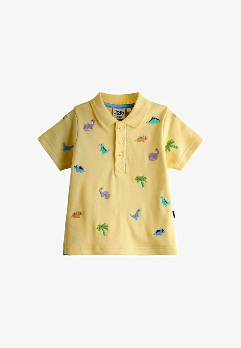 Polo jaune pour tout-petit avec des dinosaures colorés brodés et des palmiers verts, trois boutons sur le devant et manches courtes.