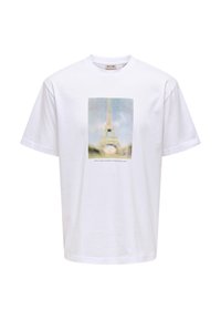 Λευκό βαμβακερό t-shirt με εκτύπωση γραφικού του Πύργου του Άιφελ και απαλό, θολωμένο φόντο. Κοντά μανίκια και άνετη εφαρμογή.