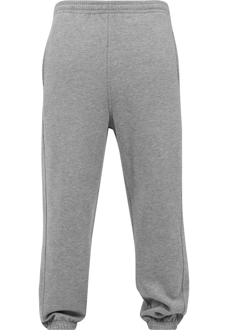 Graue Jogginghose aus Baumwollmischung, mit elastischem Bund, Bündchen an den Knöcheln und Seitentaschen. Glatte Textur mit minimaler Nahtverarbeitung.