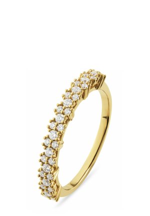 Gold ring set with multiple small round clear gemstones, featuring a curved, smooth band and prong settings for the stones.