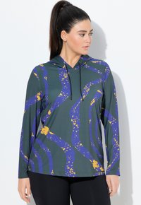 Grüner, langärmeliger Kapuzenpullover mit einem abstrakten, wellenförmigen Muster in Lila und Gelb. Hergestellt aus glattem, elastischem Stoff mit lockerer Passform.