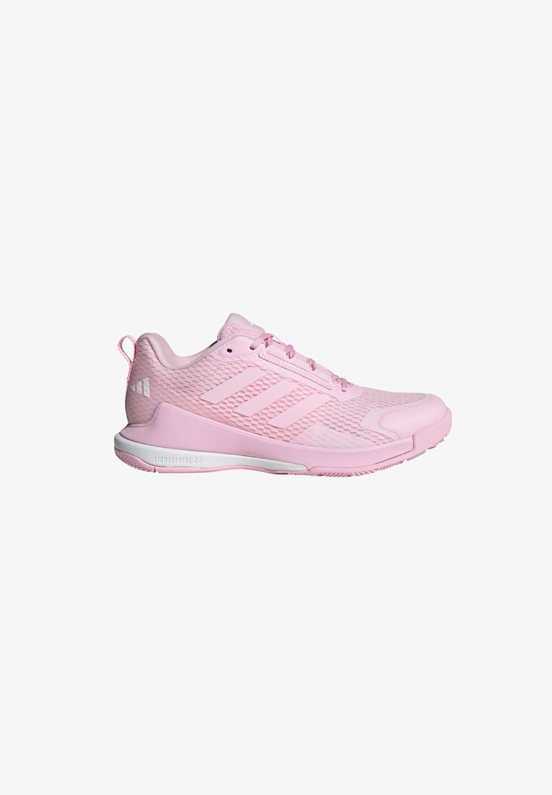 Roze sportschoenen met een gestructureerde bovenkant, witte accenten en een verstevigde neus. Voorzien van een lichtgewicht, gewatteerde zool voor comfort.