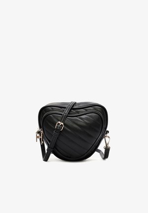 Borsa a tracolla a forma di cuore nera con motivo trapuntato e texture liscia. Presenta una tracolla rimovibile e zip e finiture in tono oro.