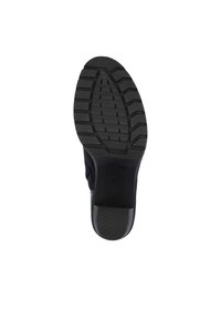 Rieker Bottines à plateau - schwarz