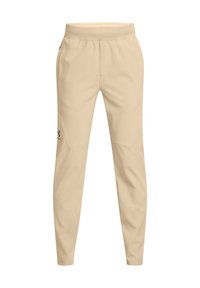 Beige sportbroek met een elastische tailleband, taps toelopende pijpen en een gestikt ontwerp. Voorzien van een klein zwart logo aan de zijkant.
