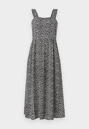 Juoda gėlėta maksi suknelė su kvadratine iškirpte, plačiomis petnešomis ir plačiu sijonu. Pagaminta iš minkštos medžiagos su mažais baltais gėlių raštais.