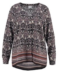 Langärmlige Bluse mit floralem Muster in Schwarz und Beige, mit abgerundetem Saum und gestreiften Akzenten in erdigen Tönen.