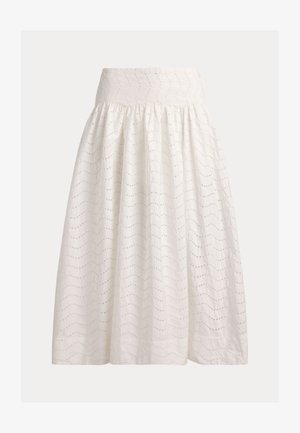 Jupe blanche mi-longue avec taille haute et motif discret ondulé en œillets sur tout le tissu.