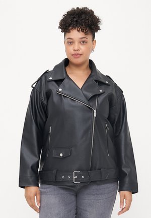 Black faux leather biker jacket with silver zippers, a belted waist, wide lapels, and shoulder epaulets. Textured surface and relaxed fit.