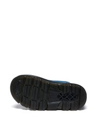 Sola de sapato de borracha preta com sulcos profundos e superfície texturizada; elementos de amortecimento visíveis; possui uma parte superior azul.