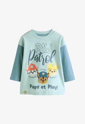 Camiseta de algodón azul claro con tres personajes de dibujos animados de perros, texto de "Paw Patrol", mangas cortas y detalles bordados en las caras de los perros.