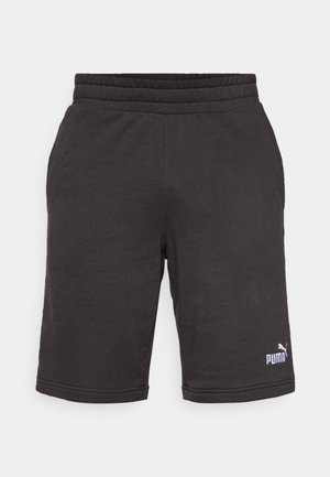 Crne atletske kratke hlače s elastičnom waistbandom, koje imaju mekanu teksturu i mali bijeli Puma logo na donjoj lijevoj nozi.