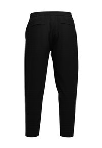 Svarte treningsbukser med løs passform, elastisk midjebånd, to baklommer og en glatt, lett stofftekstur.