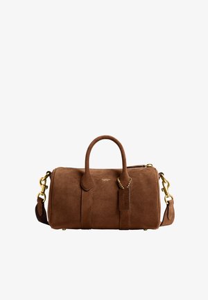 Brown suede Coach duffel bag with top handles, detachable shoulder strap, gold hardware, and a leather tag.
