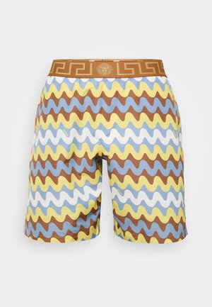 Shorts de bain avec un motif ondulé en marron, bleu, jaune et blanc. Taille élastique avec un design décoratif de clés grecques et un détail de logo.