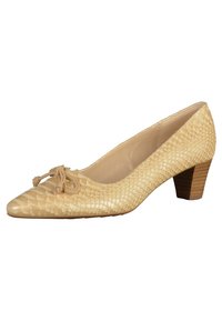Escarpin beige texturé à petit talon avec bout pointu et petit détail nœud, doté d’un talon bloc en bois empilé.