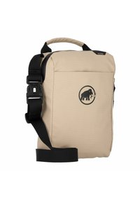 Beige tygväska med messenger-stil, svart rem och handtag, med en cirkulär logotyp av en elefant. Slät textur, minimalistisk design.