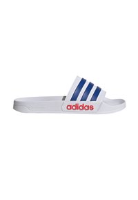 White slide sandal with three blue stripes and red "adidas" logo on the strap. Made from textured material, featuring a curved sole.