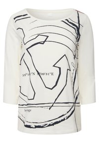 Helle Creme Langarmoberteil mit abstrakten schwarzen grafischen Designs und Text. Weicher Baumwollstoff mit rundem Halsausschnitt und lockerer Passform.