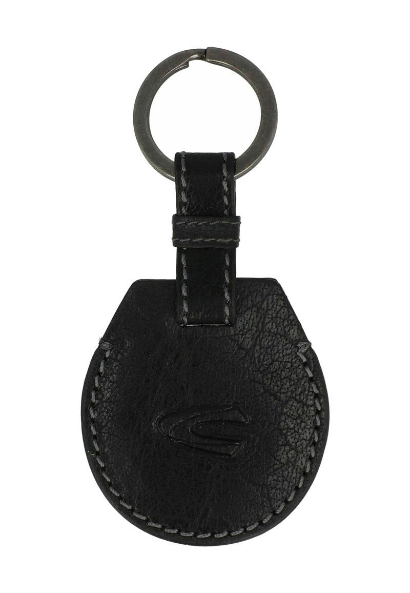 Porte-clés en cuir noir de forme circulaire, avec une surface texturée, des détails cousus et un attache-clé en métal.
