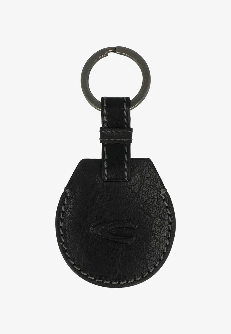 Black leather keychain with a circular shape, textured surface, stitched detailing, and a metal keyring attachment.