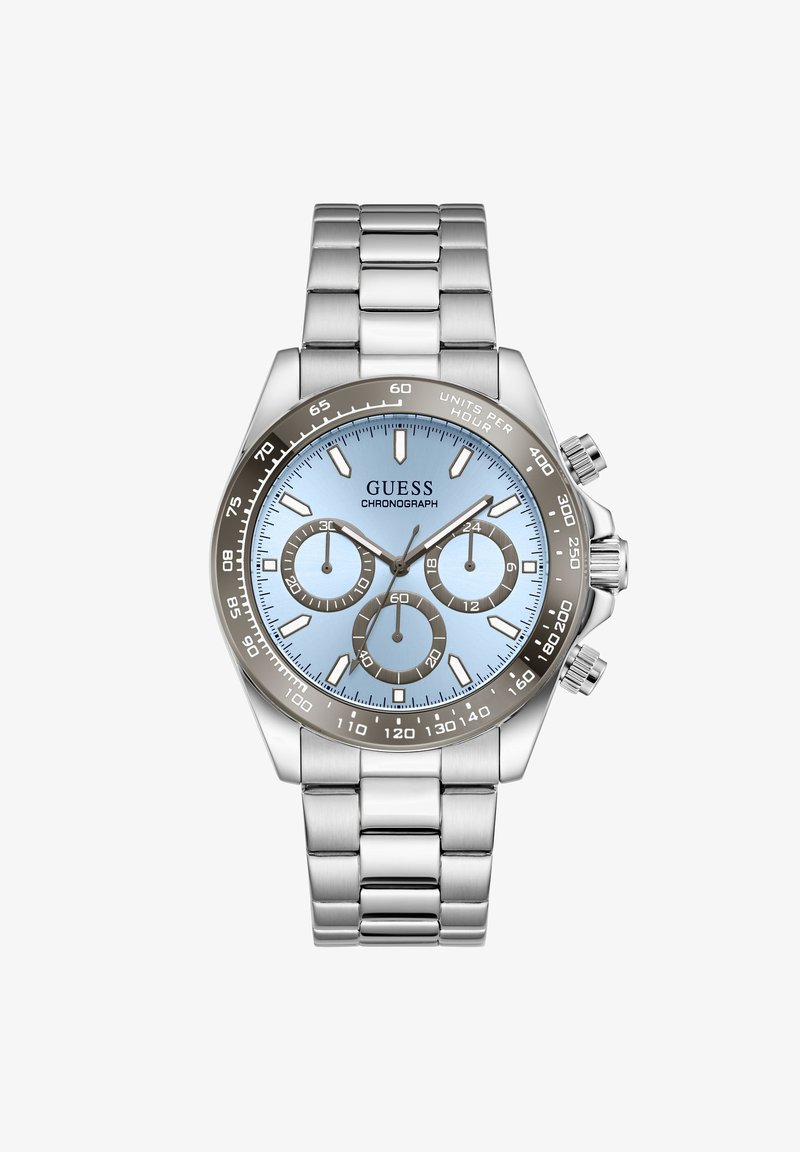Ασημένιο ρολόι Guess με χρονογράφο από ανοξείδωτο ατσάλι, ανοιχτό μπλε καντράν, τρεις υποκαντράν και στεφάνη ταχυμέτρου, μπρασελέ με μεταλλικούς κρίκους.