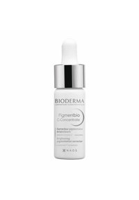 Flacon compte-gouttes en verre blanc avec un capuchon argenté. L'étiquette indique "Bioderma Pigmentbio C-Concentrate" avec des informations en anglais et en français.