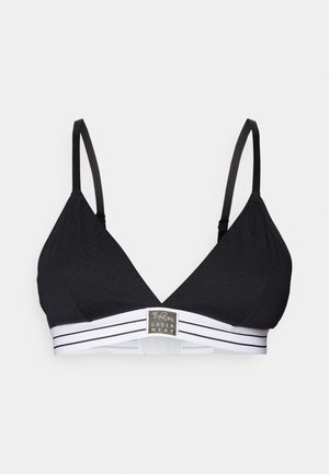 Black triangle bralette with thin black straps and a white elastic band featuring two black stripes and a square logo patch at the center.