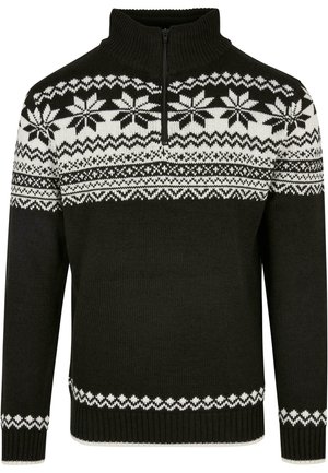 Melna adīta džemperis ar rāvējslēdzēja apkakli, ar baltām sniegpārsliņu rakstiem augšējā ķermeņa daļā un ribotām piedurknēm un apakšmalu.