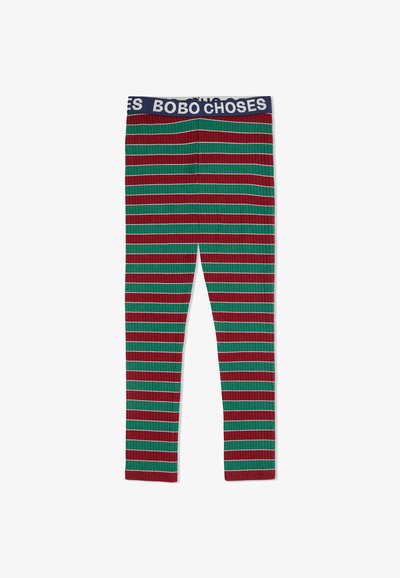 Geribbelde leggings met een multicolor patroon van rode, groene en witte strepen; beschikt over een marineblauwe tailleband met de tekst "BOBO CHOSE".