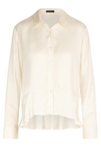 Blusa color crema con bottoni davanti, colletto e maniche lunghe. Tessuto liscio e leggero con orlo curvo.