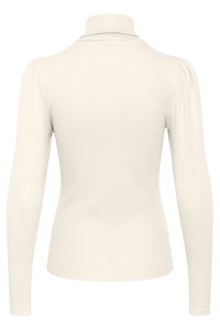 Haut à col roulé à manches longues en tissu côtelé crème clair, présentant une silhouette ajustée et des détails froncés aux épaules.