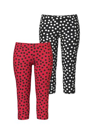 To par capri-leggings, den ene rød med sorte polkaprikker og den anden sort med hvide polkaprikker, vist side om side.