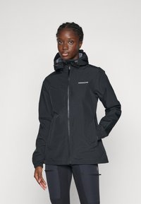 Black waterproof jacket with a drawstring hood, zip closure, and logo detail on the chest. Features elastic cuffs and a relaxed fit.