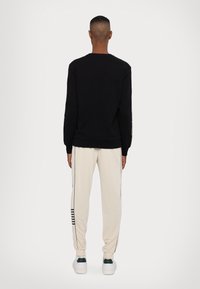 EA7 Emporio Armani FELPA - Ikdienas džemperis - black