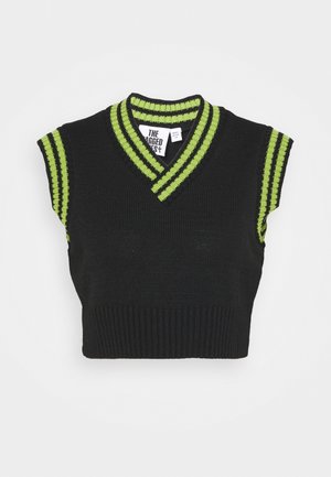 Top court sans manches en maille noire avec double rayures vertes sur le col en V et les emmanchures, avec un ourlet côtelé.