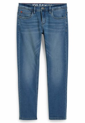 Jean jogger en denim bleu clair avec une silhouette ajustée, cinq poches et une texture légèrement décolorée. Doté d'une fermeture par bouton et fermeture éclair.