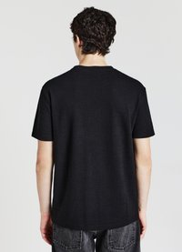 Calliope TESSUTO DEVORÈ - T-shirt basic - nero