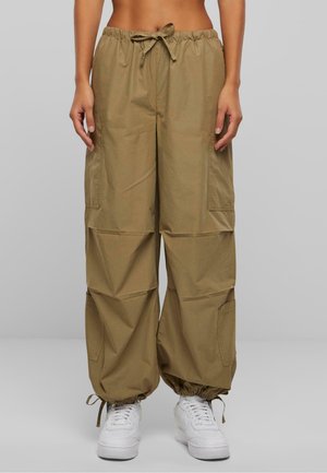 Khaki cargo pants with a drawstring waist, two side pockets, and elastic cuffs. Made of lightweight fabric, tailored for a loose fit.